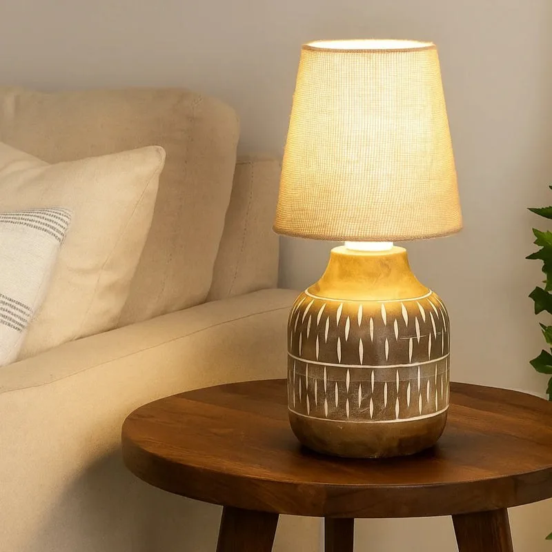 Carved wood table lamp